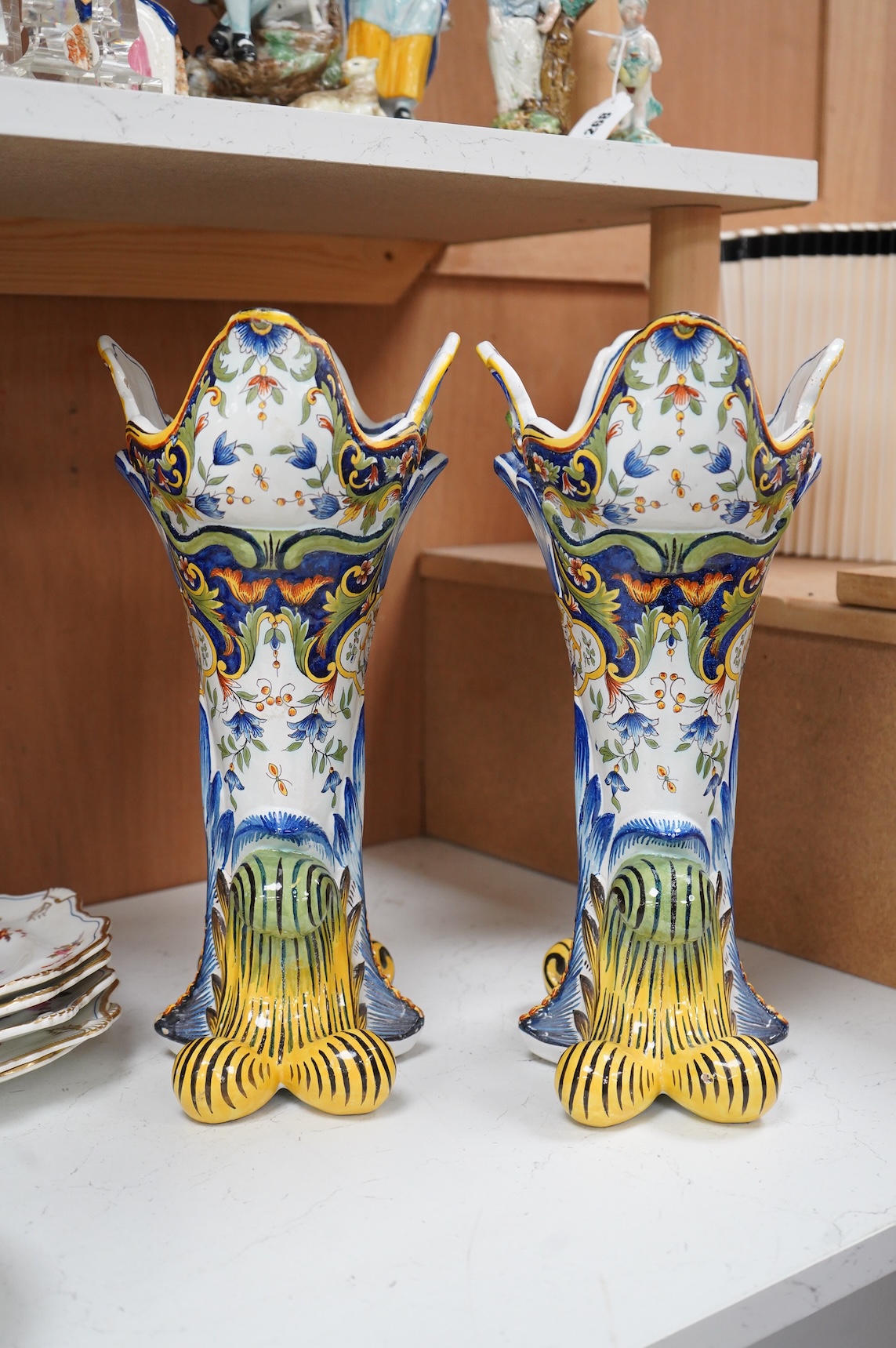 A pair of early 20th century French faience vases, 37cm high